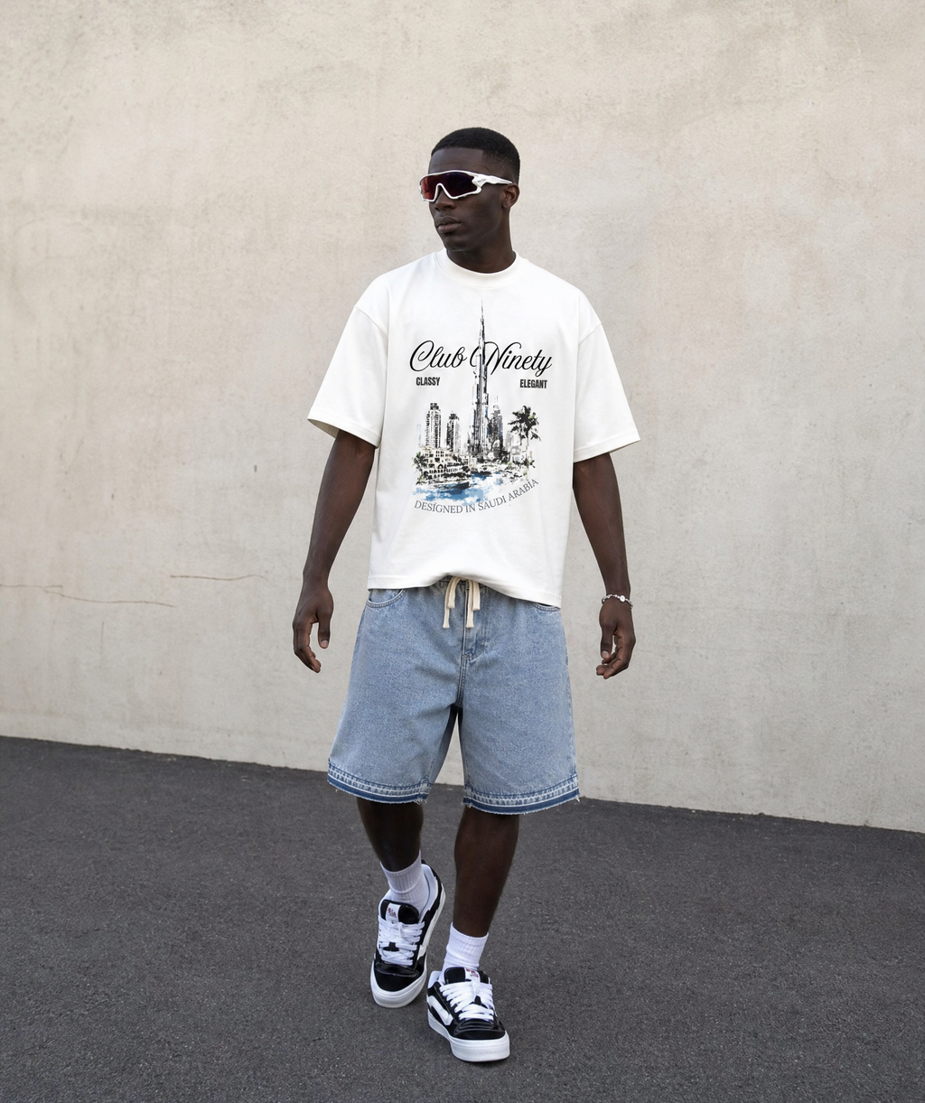 loose denim jorts in light wash blue with tint