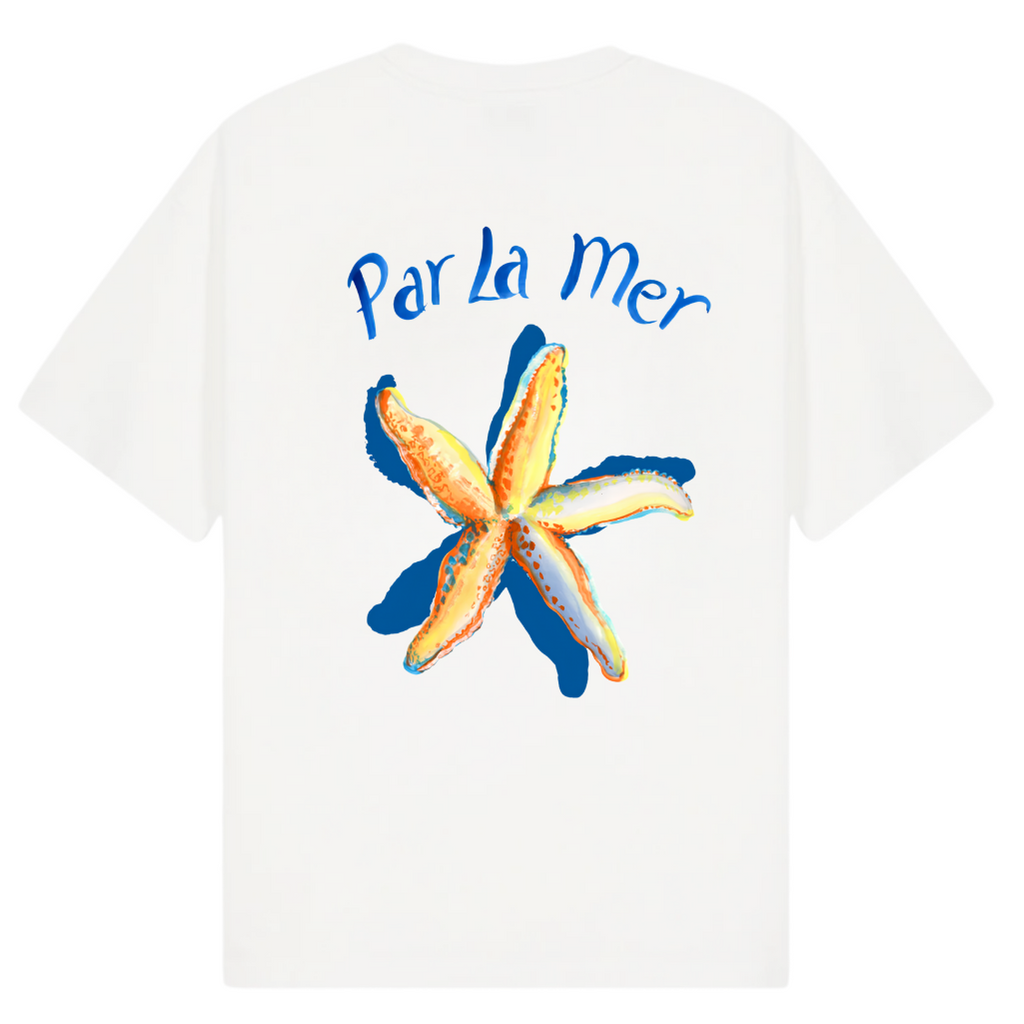 A white short-sleeve t-shirt shown from the back, featuring a colorful graphic print of a starfish and the text 'Par La Mer' in blue. The image includes branding text for 'Club Ninety' and 'The Gallery Drop' along with 'Collections SS26 Best Seller' text overlays.