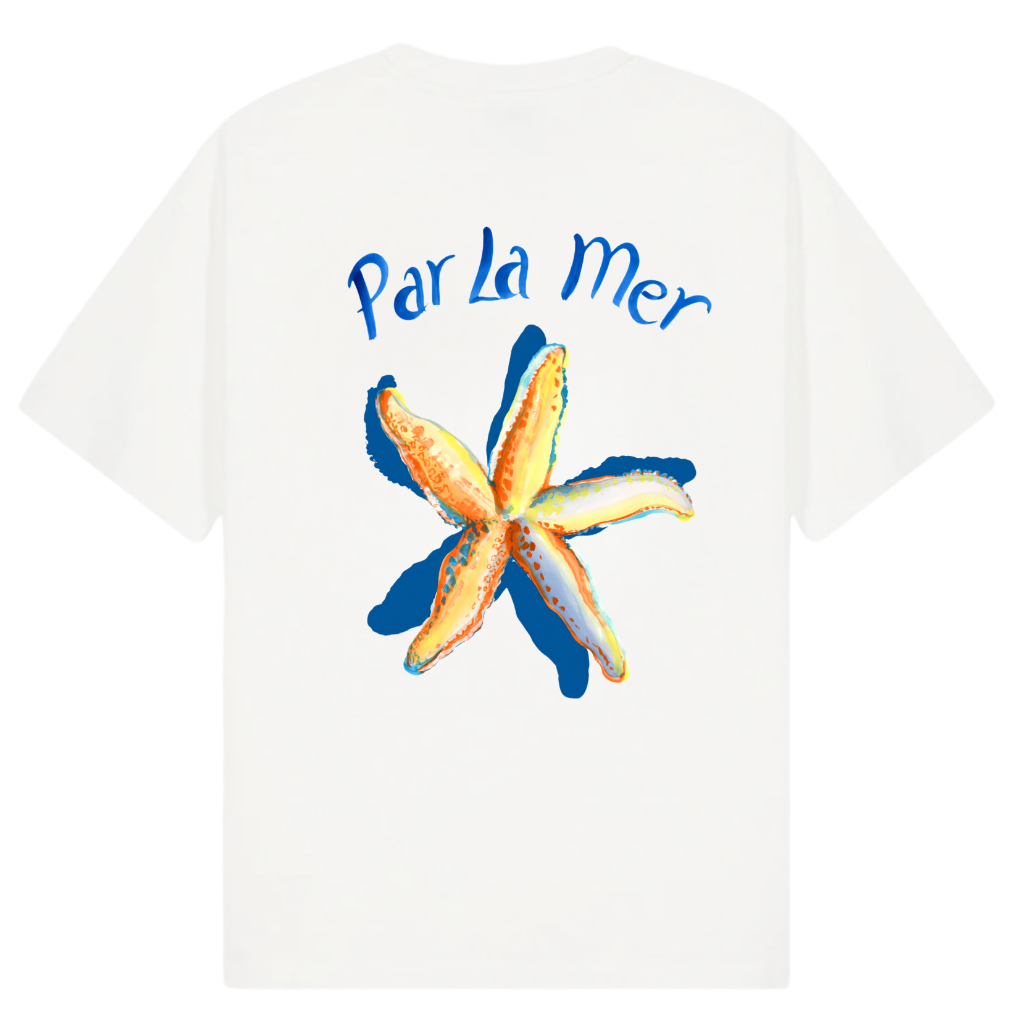 A white short-sleeve t-shirt shown from the back, featuring a colorful graphic print of a starfish and the text 'Par La Mer' in blue. The image includes branding text for 'Club Ninety' and 'The Gallery Drop' along with 'Collections SS26 Best Seller' text overlays.